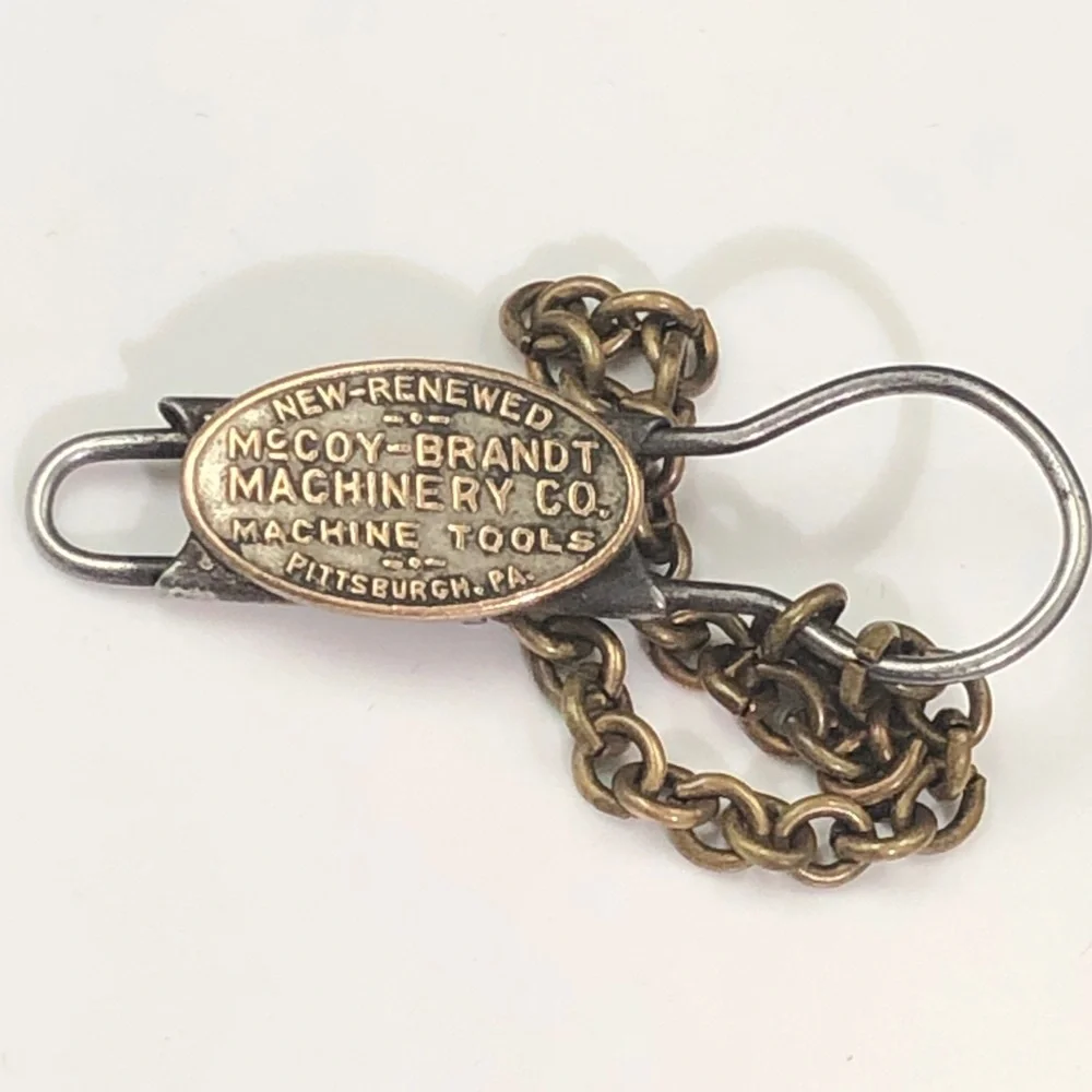 Antique McCoy -Brandt Vintage Machinery Tag Keychain in Brass and Silver Tones